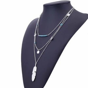 NWT Boutique Triple layer boho feather necklace